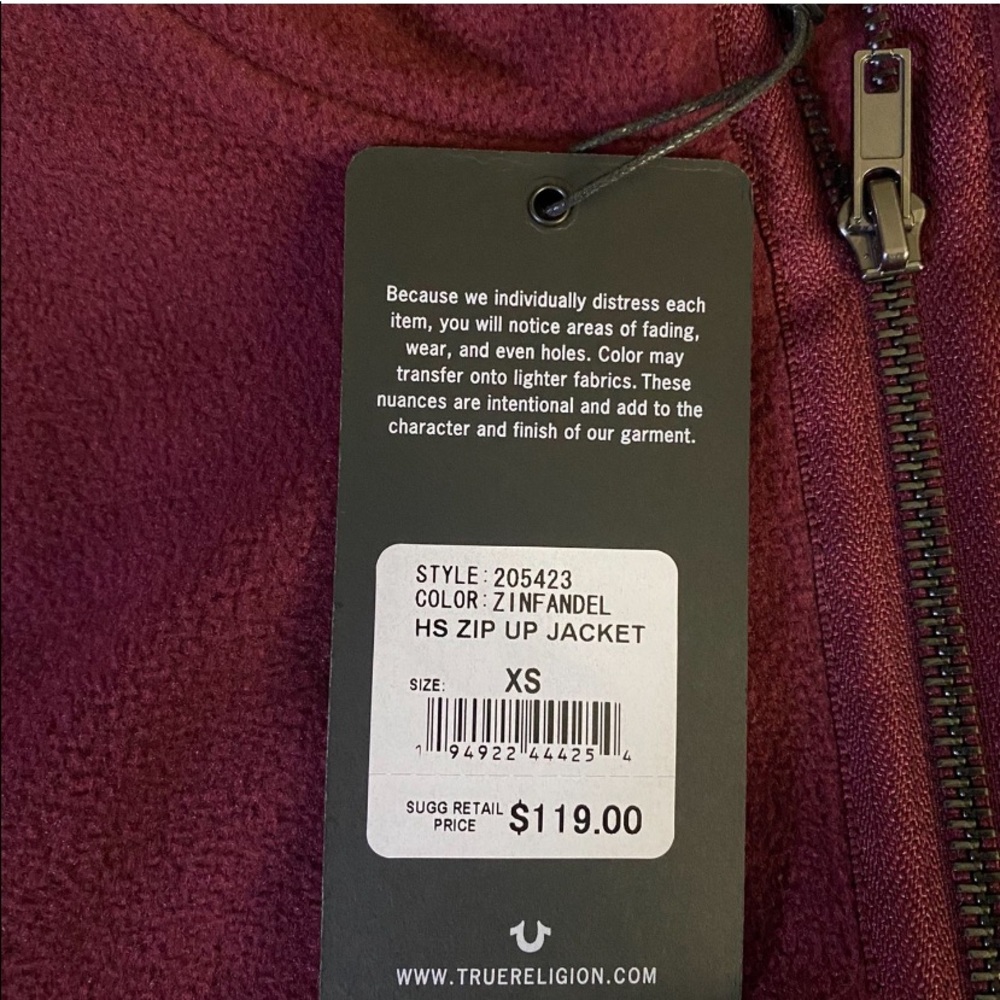 it’s an xs zip up true religion sweater